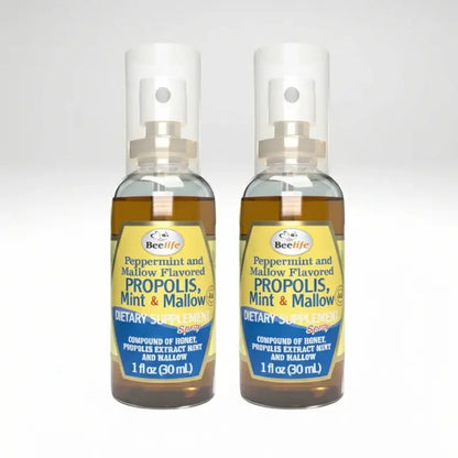 Two bottles of BeeLife peppermint and mallow flavored propolis spray on a white background