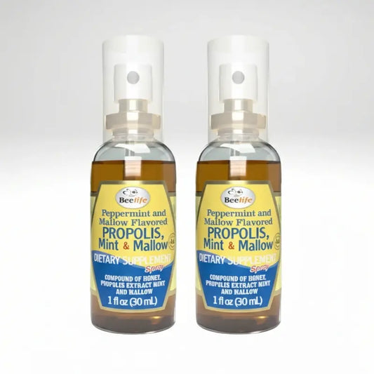 Two bottles of BeeLife peppermint and mallow flavored propolis spray on a white background