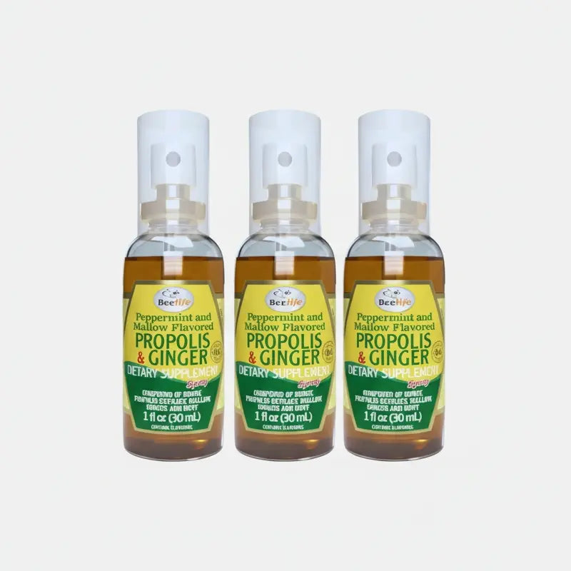Combo of three bottles of ginger propolis on a white background
