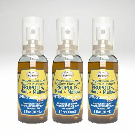 Three bottles of BeeLife peppermint and mallow flavored propolis, mint, and mallow dietary supplement on a white background.